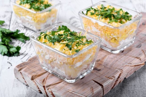 Puff salad with pineapple, chicken, cheese and eggs