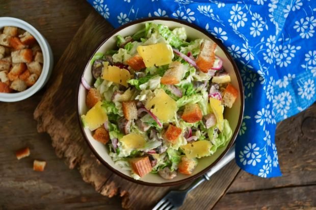 Peking cabbage salad with pickled mushrooms and crackers is a simple and delicious recipe how to cook step by step