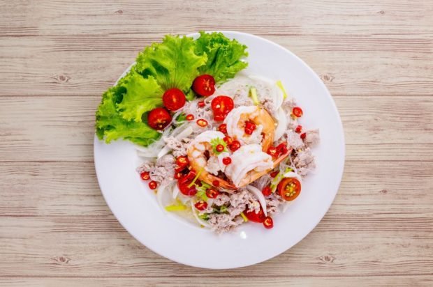 Funchosa salad with shrimp, canned fish and pickled pepper 