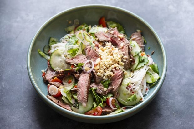 Salad with funchosa and beef