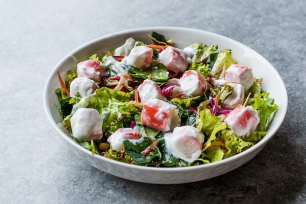 Green salad with crab sticks