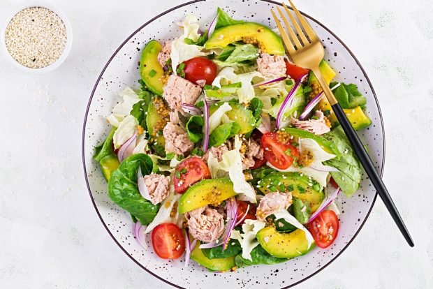 Diet salad with canned fish and avocado