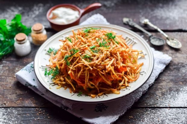 Salad of mushrooms, fried potatoes and Korean carrots