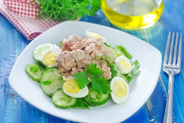 Salad with cucumbers, cod liver and quail eggs