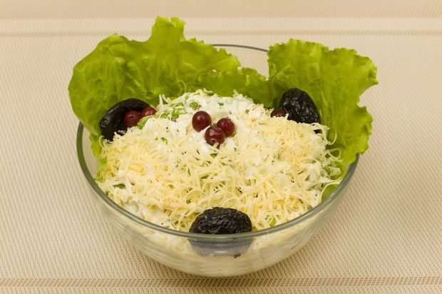 Squid salad with hard cheese and prunes is a simple and delicious recipe, how to cook step by step