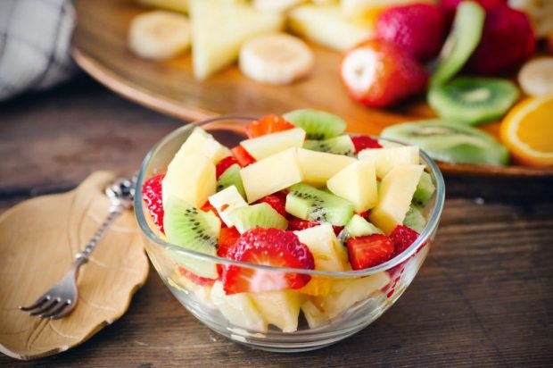 Fruit salad of melon, strawberry and kiwi