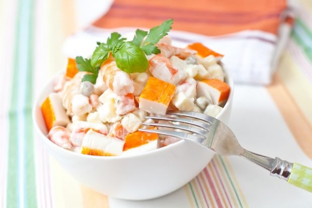 Homemade crab salad with canned peas