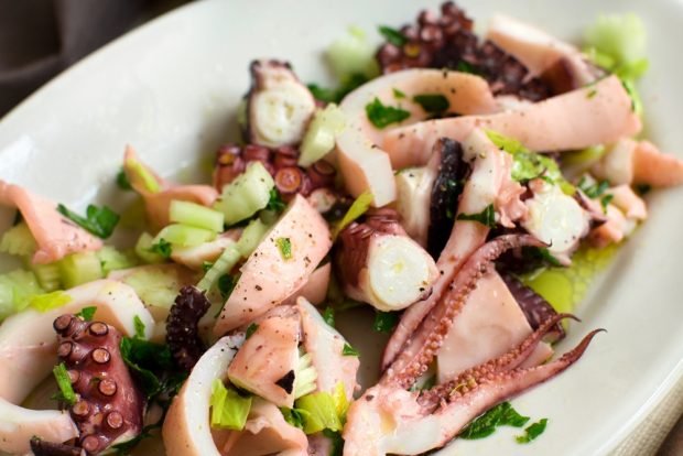 Salad with sea cocktail and celery