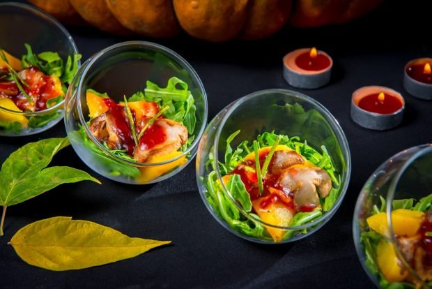 Cocktail salad with mushrooms and pumpkin