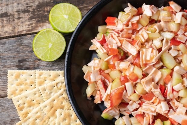 Salad with crab sticks, pear and chili sauce