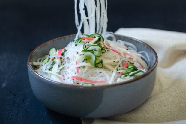 Salad with funchosa, crab sticks and cucumbers 