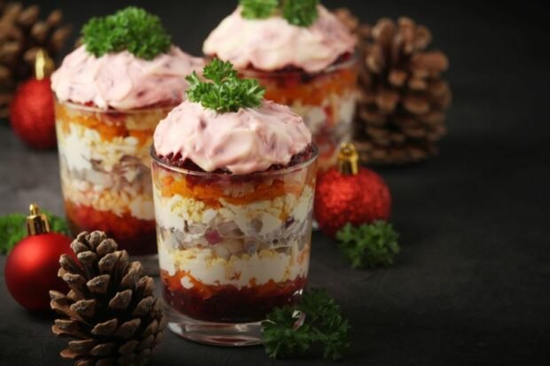 Herring under a fur coat in cups is a simple and delicious recipe for cooking step by step