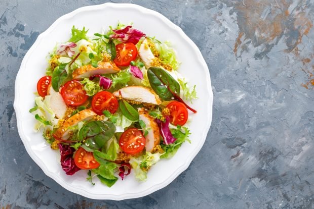 Multicolored salad with smoked chicken is a simple and delicious recipe for cooking step by step