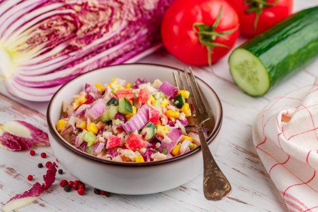 Salad with crab sticks and purple Peking cabbage