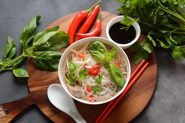 Salad of funchosa, pork and enoki mushrooms