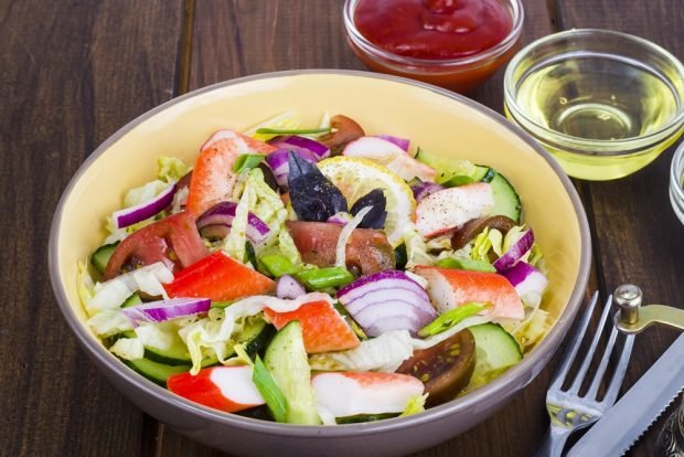 Colorful salad with crab sticks