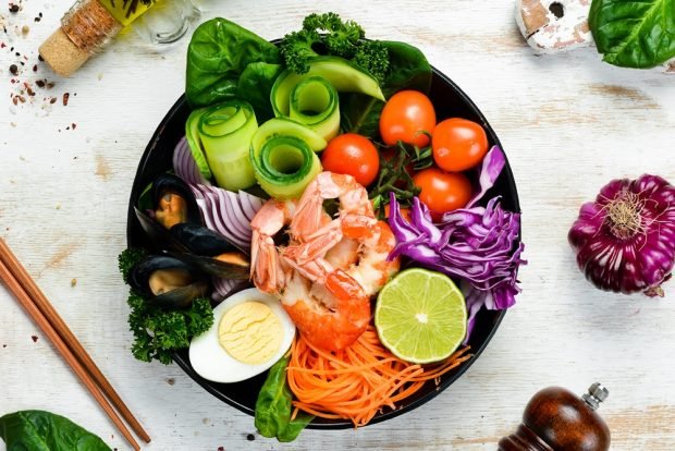 Salad bowl with seafood and eggs