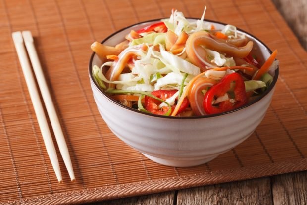 Salad with cabbage and pork ears