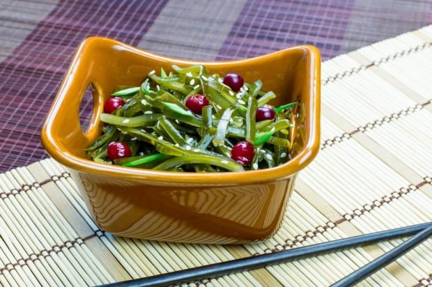 Seaweed salad with cranberries and pickled onions