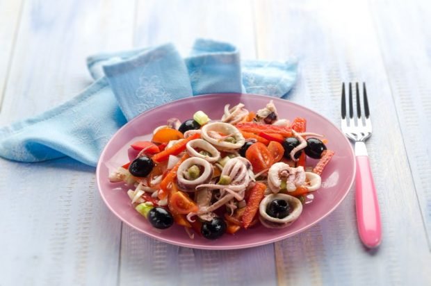 Vegetable salad with squid, octopus and olives