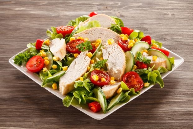 Salad with chicken, vegetables and canned corn 