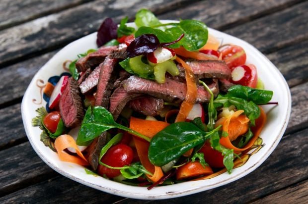 Meat salad with beef, radish, celery and pickled ginger