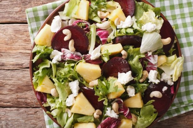 Salad with boiled beetroot, feta and pineapples