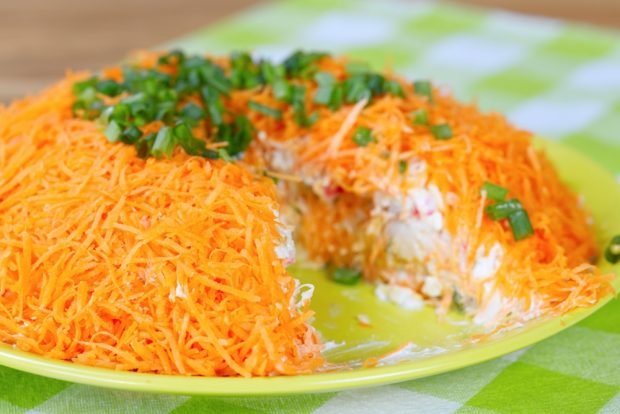 Crab salad under a carrot coat is a simple and delicious recipe, how to cook step by step