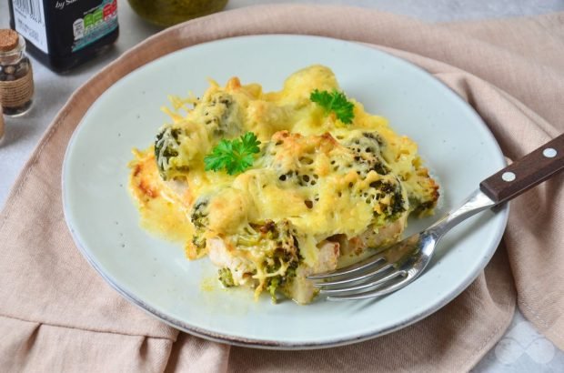 Chicken with broccoli under cheese