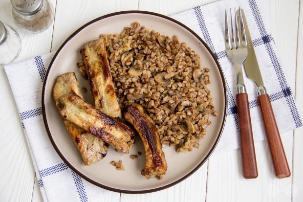 Pork ribs with buckwheat in the oven