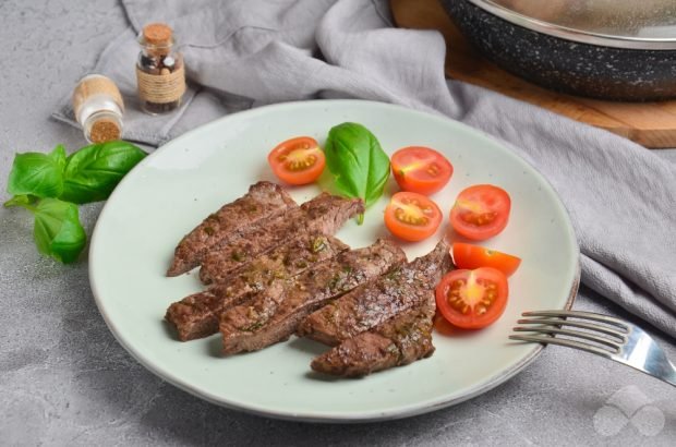 Beef steak in a frying pan