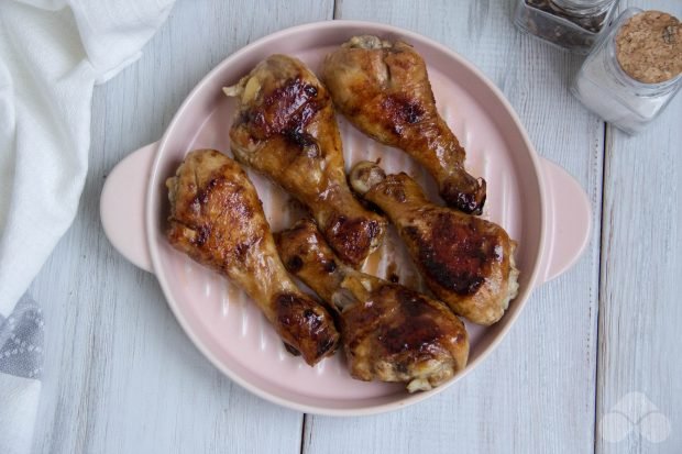 Teriyaki chicken legs in a frying pan