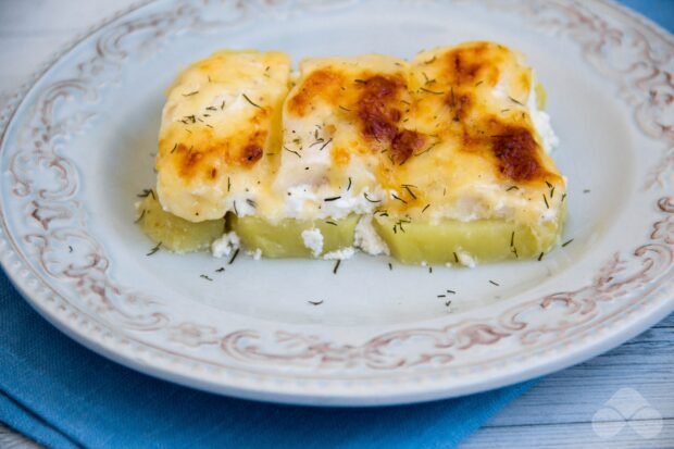 Cod with potatoes and cheese in the oven