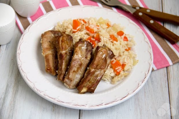 Pork ribs with rice in the oven