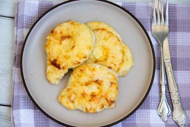 Chicken chops with pineapple and cheese in the oven