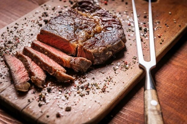 Juicy pork steak in the oven