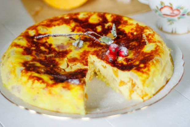 Cottage cheese casserole with banana and pumpkin in a frying pan