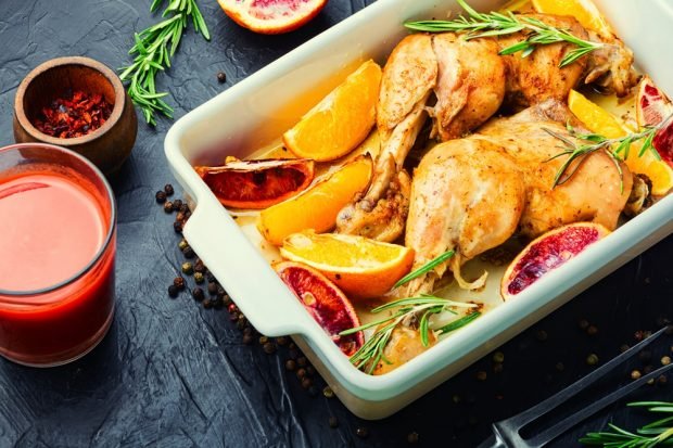 Chicken legs with oranges in the oven 