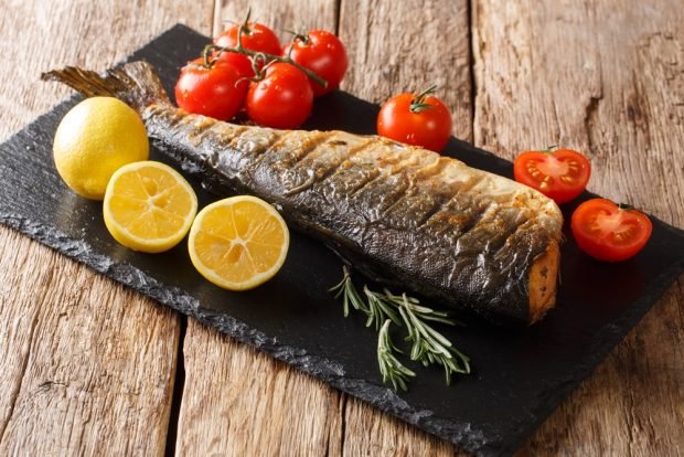 Whole baked pink salmon in the oven 