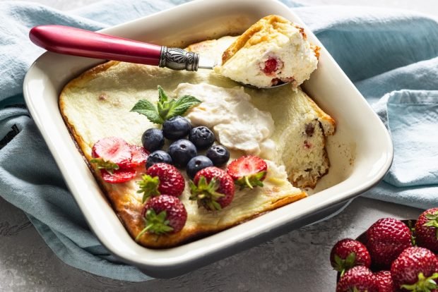 Cottage cheese casserole with berries on whipped whites