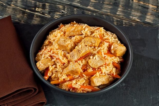 Pork pilaf with tomato sauce in a slow cooker – a simple and delicious recipe, how to cook step by step