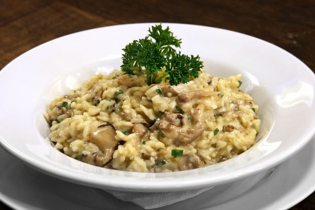 Risotto with chicken and mushrooms in cream sauce