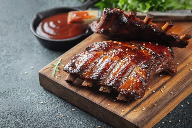 Pork ribs in barbecue sauce in the oven