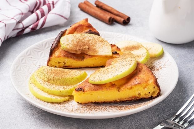 Cottage cheese casserole with apples in a frying pan 