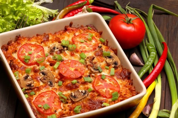 Zucchini casserole with mushrooms and tomatoes 