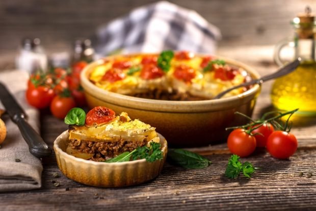 Potato casserole with minced meat and cherry tomatoes