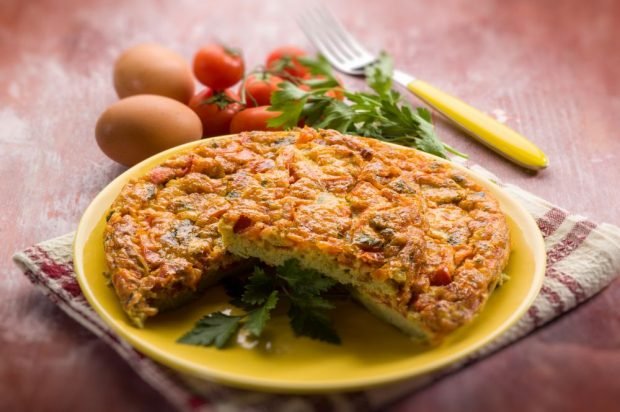 Omelet with tomatoes and onions in the oven