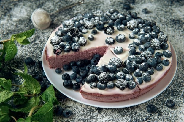 Cottage cheese casserole with blueberries in a frying pan