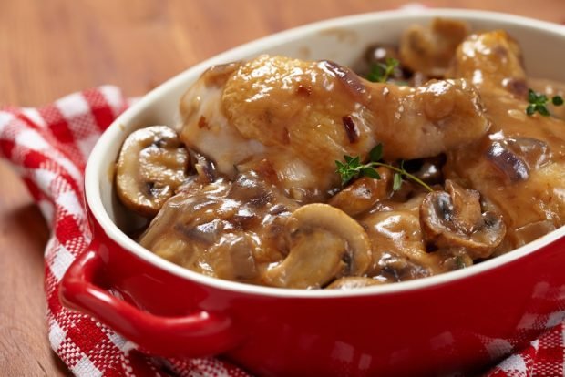 Chicken legs with mushrooms in the oven