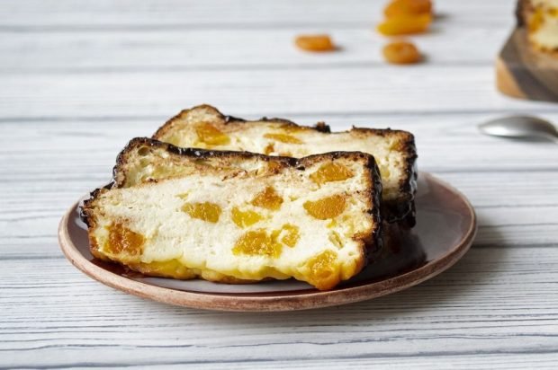 Cottage cheese casserole with dried apricots and chocolate glaze